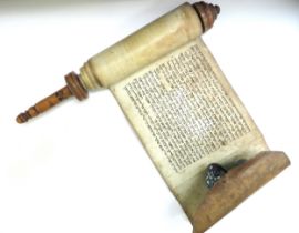 A late 18th/ early 19thc Book of Esther scroll in Hebrew on vellum with turned boxwood handle,