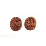 Two miniature boxwood carved dioramas, 23mm x 16mm