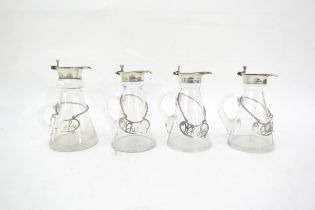 Four glass whisky noggins with silver tops (Levi & Salaman, Birmingham, 1921) with cut-out silver