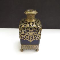 A Victorian Bristol Blue glass perfume bottle with ormolu overlay, lift up top with inlaid image and