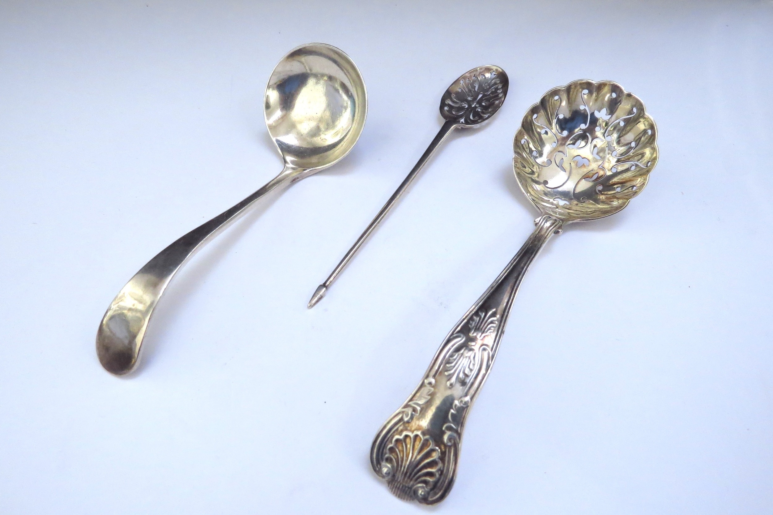 A silver sugar sifting spoon, Birmingham 1903, silver sauce ladle, Sheffield 1919 and a silver - Image 2 of 2