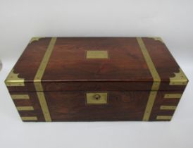 A late 19th Century campaign writing box with inset brass plaque inscribed Mr Benjamin words from