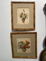 A pair of Chinese 19th Century paintings on silk depicting still-life floral displays in faux bamboo