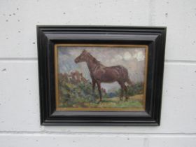 MARGARET THEYRE (1897-1977) A framed and glazed oil on board of a black horse in landscape. Signed
