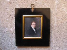 A 19th Century watercolour on ivory panel of a young gentleman. Unsigned. Set in period frame. Image