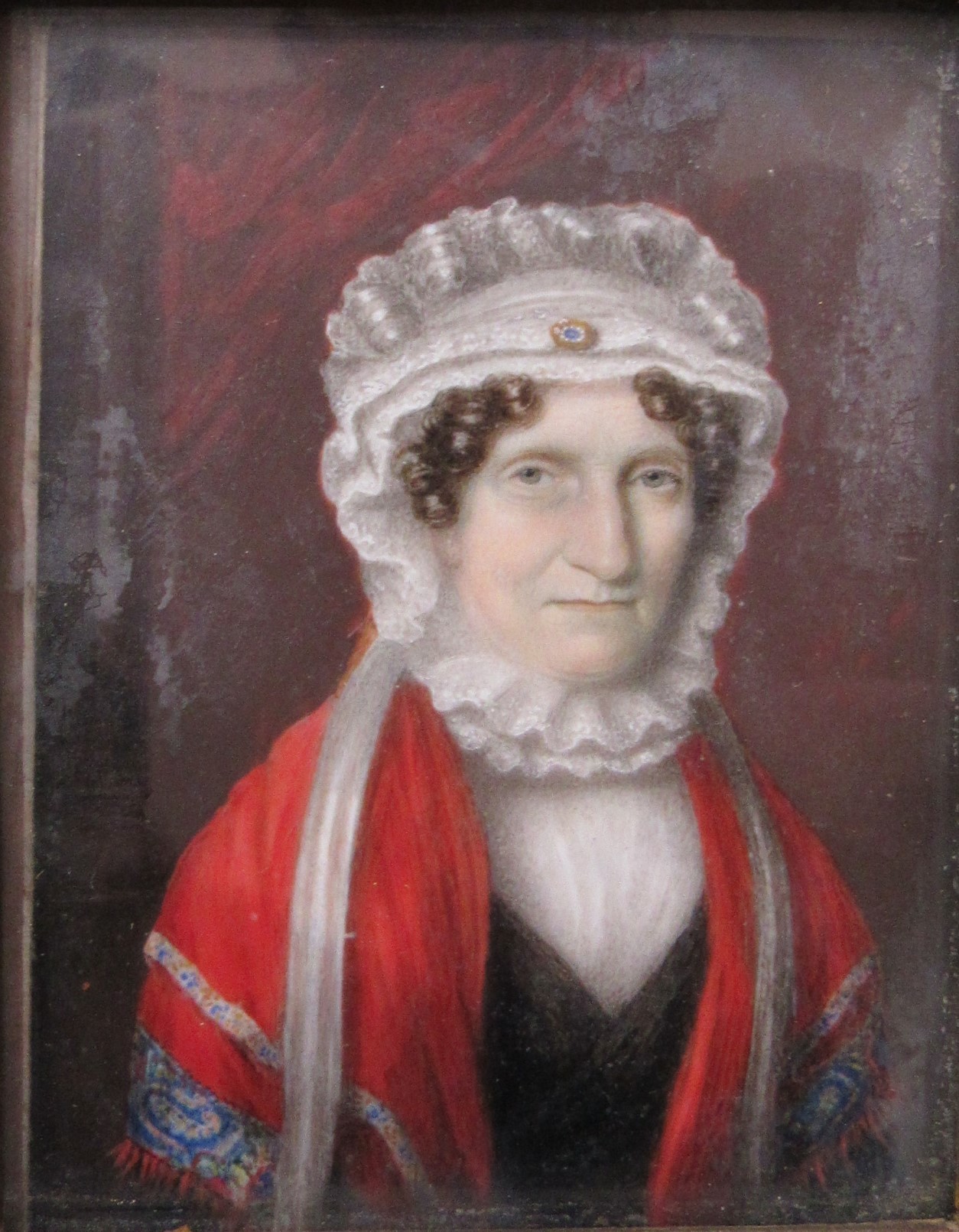 A 19th Century watercolour on ivory panel of a woman in white bonnet and red cloak. Unsigned. Set in - Image 2 of 4