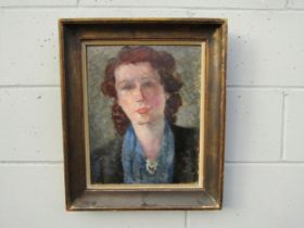 ANDRE GUERBILSKY (1907-1992) A framed oil on board, portrait of a woman. Signed top right. Label