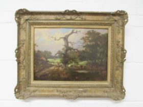 An early 19th Century ornate gilt framed oil on board, pastoral landscape with stream side dwelling,