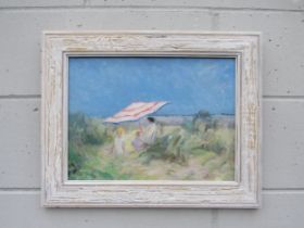 GEOFFREY WILSON (1920-2010) A framed oil on board - Figures on Walberswick Beach, Suffolk. Signed