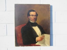 A circa mid 19th Century unframed oil on canvas portrait of a gentleman. Later cut and stuck to a