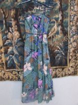 A 1970's "Kerena" model fine cotton full length dress, fully lined, a bold pattern in muted blue/