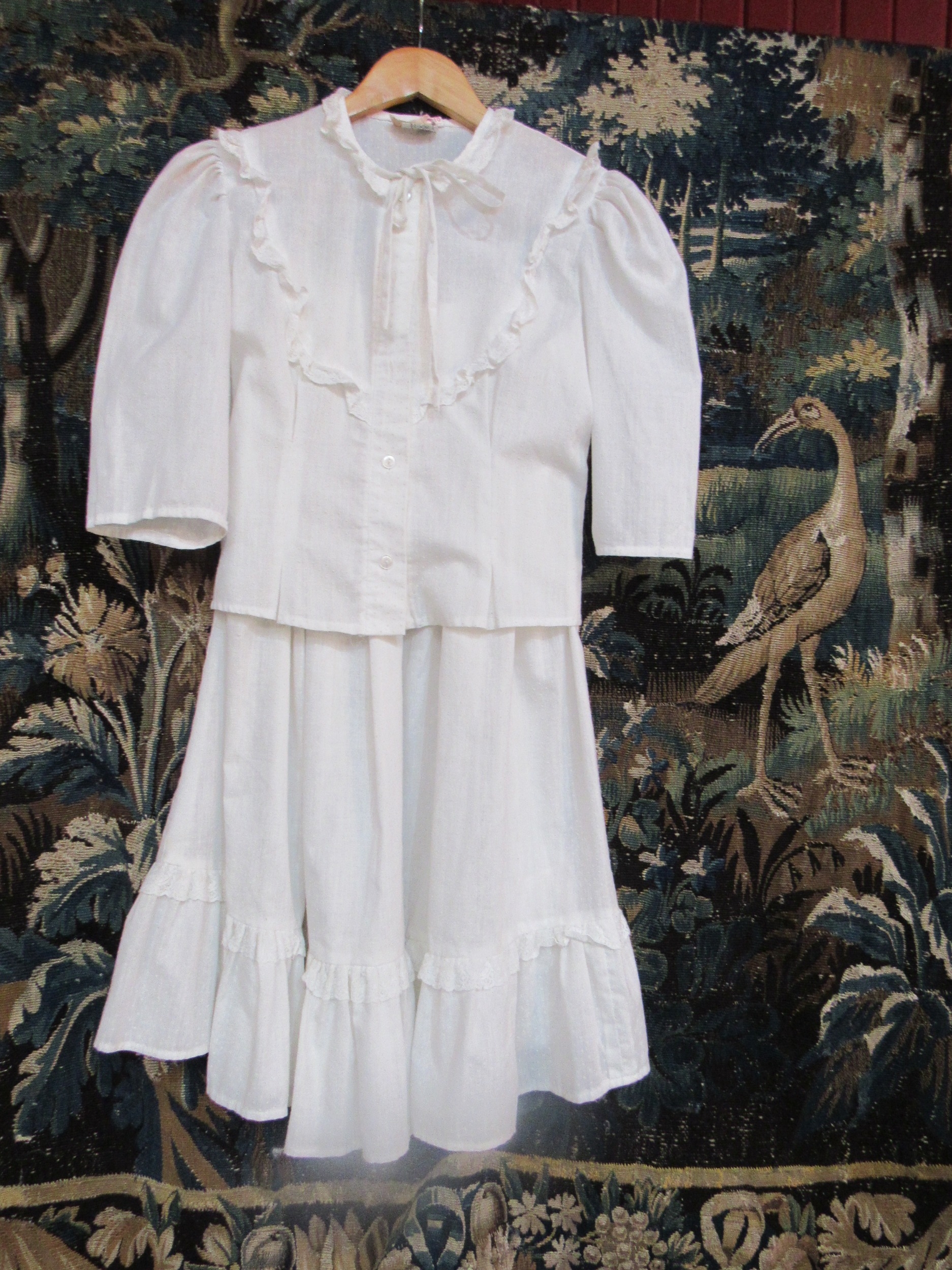 A Monix two piece white blouse and skirt