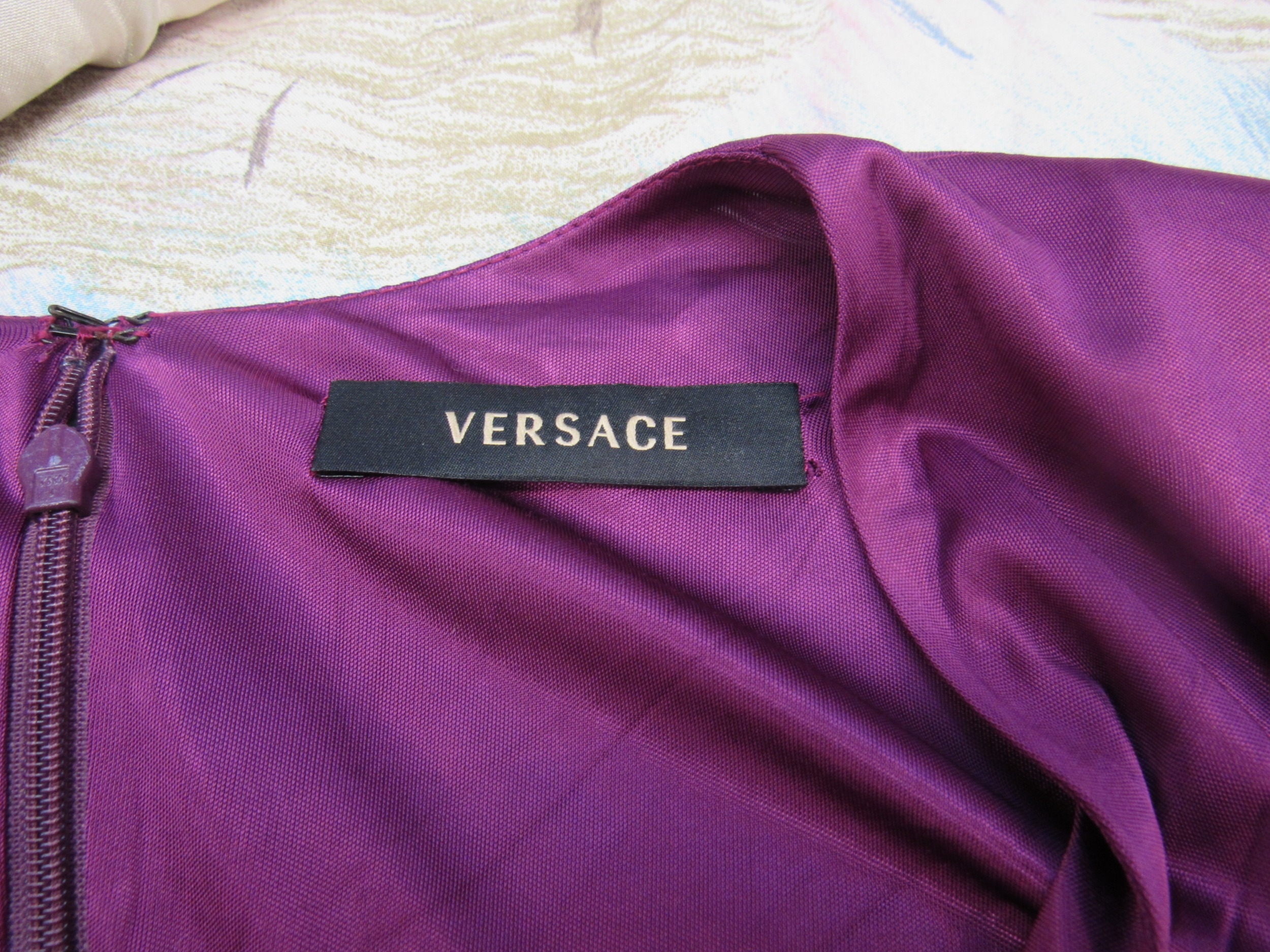 VERSACE: A purple viscose and rayon long sleeve dress with a heavily ruched bodice and deep "V" - Image 4 of 5