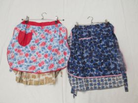 Three vintage cotton patterned waist pinnies