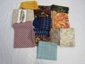 A box containing various fabrics