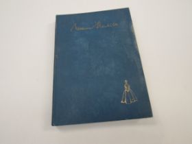 A hardback book entitled "Norman Hartnell" containing autograph and a personalised message dated
