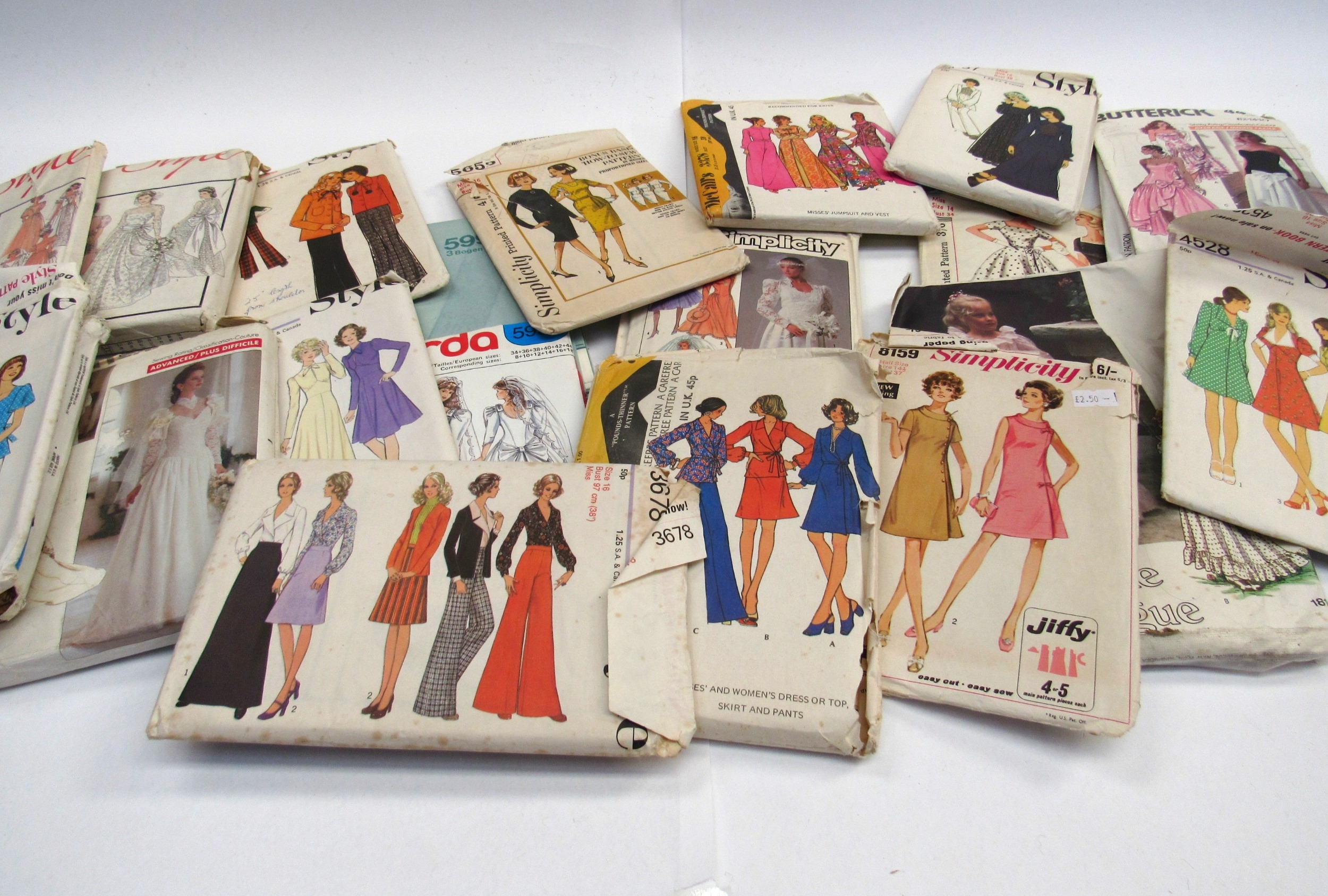 A bag containing mid 20th Century and later sewing patterns including fashion and wedding patterns