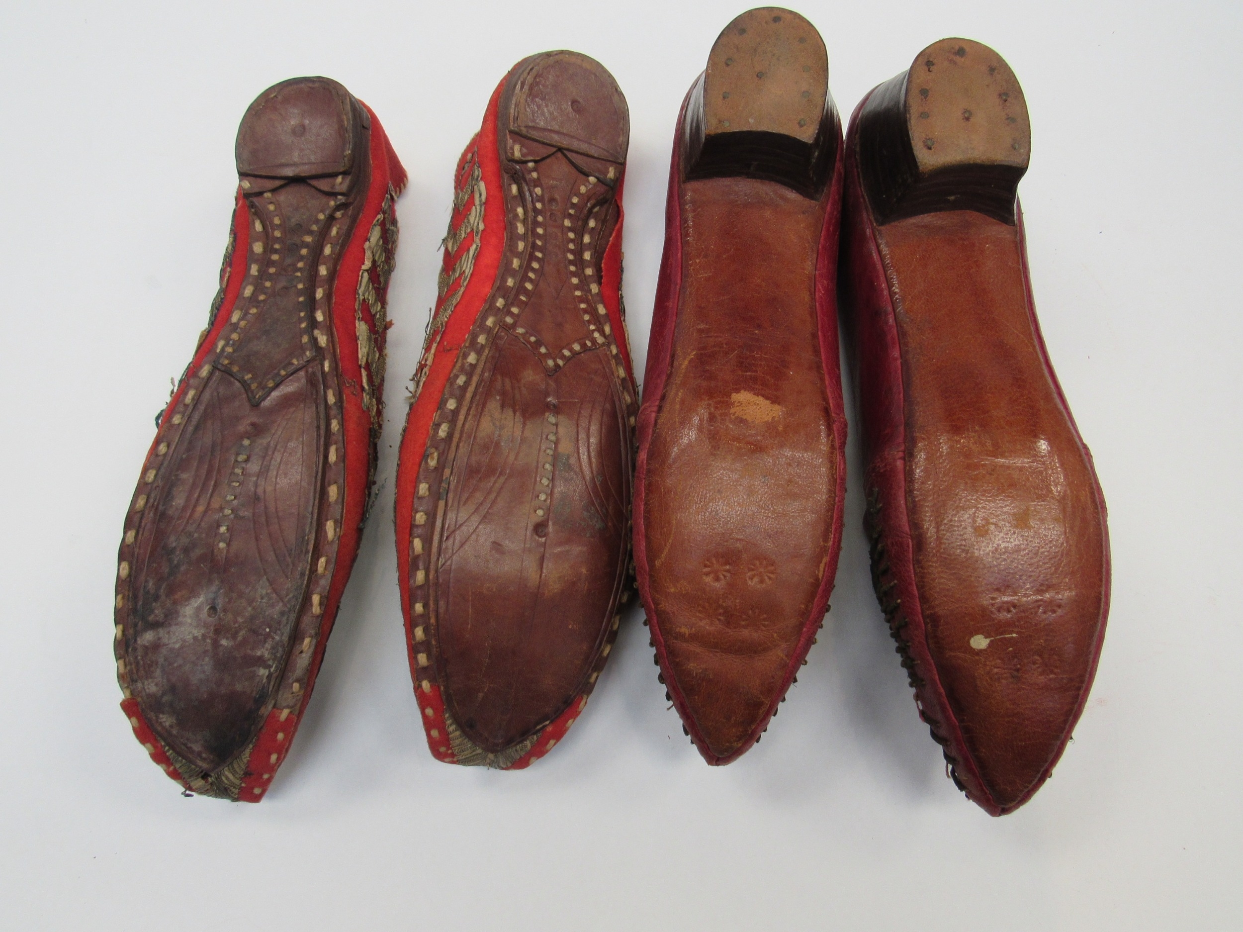 A pair of early 20th Century red felt slippers, Eastern turned-up toe with gilt wirework detail, - Image 2 of 4
