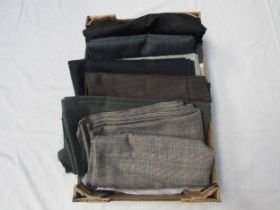 A box of suiting (7 large lengths)