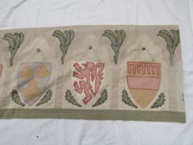 An Arts & Crafts Heraldic room size banner with named family crests to include Mandeville, Roos,