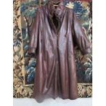 A superb chocolate brown soft leather ladies coat with a fine beaver lamb lining which is removable.