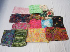 A box of assorted cotton and linen vibrant prints circa 1930's - 1960's large and medium scale