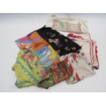 A box containing silk scarves to include Christian Dior, 1960's Pucci style, 1940's poodle print,