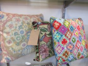 Six modern tapestry cushions, some reputedly Kaffe Fassett