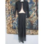 LILLIE Ruben: A black full length jersey crepe evening cat-suit with black beading to the round