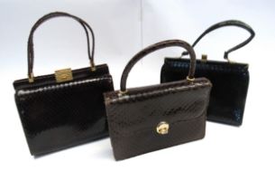 Three mid 20th Century snakeskin handbags, two brown, one black and a small quantity of ladies