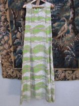 A 1970's homemade long green patterned dress