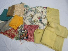 A selection of textile/fabric remnants in various styles and sizes comprising linens, florals,