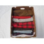 A box of various wool fabrics (7)