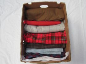 A box of various wool fabrics (7)