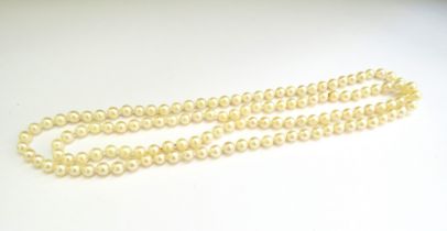 A single strand pearl necklace, 88cm long