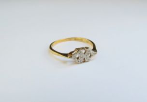 An 18ct gold diamond ring in open setting. Size P/Q, 2g