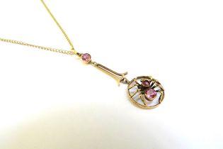 A 9ct gold negligee necklace of a spider set with pink stones, hung on chain, 46cm long, 2.5g