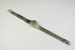 A 9ct white gold Tissot wristwatch, bracelet as found