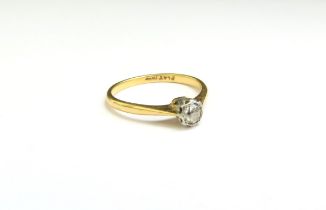 A diamond solitaire ring, stamped plat/18ct. Size N, 2.1g
