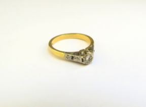 An illusion set diamond ring, stamped 18ct/plat. Size K, 3.4g