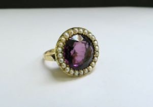An amethyst and seed pearl ring, 2cm diameter. Size L, 8.1g