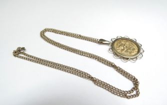 A gold half sovereign in a 9ct gold mount hung on unmarked chain, 46cm long, 8.1g
