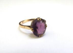 A 9ct gold ring set with an oval amethyst. Size O, 2.6g