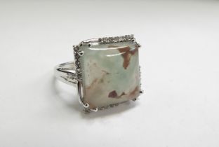 An aquaprase square cushion form ring, stamped 925. Size O, 5.2g
