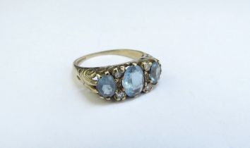 A 9ct gold aquamarine and diamond ring. Size L, 2.1g