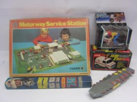 A boxed Corgi L5801 Electronic Flash, Smash and Crash Ambulance, Casdon Motorway Service Station,