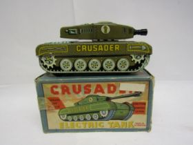 A boxed tinplate battery powered Crusader Electric Tank, made in Great Britain, model no 9/103