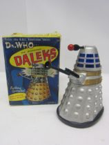 A boxed Louis Marx & Co 1964 Dr Who... The Mysterious Daleks battery operated silver plastic Dalek