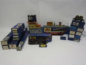 A collection of boxed Hornby Dublo 00 gauge rolling stock and accessories to include EDL18 BR