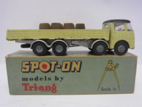 A Triang Spot-On 109/3 diecast model ERF 68G with Flat Float with Sides, light yellow cab with black